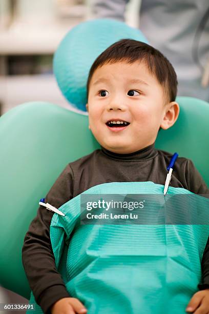 kid waiting for seeing dentist - dental office front stock pictures, royalty-free photos & images