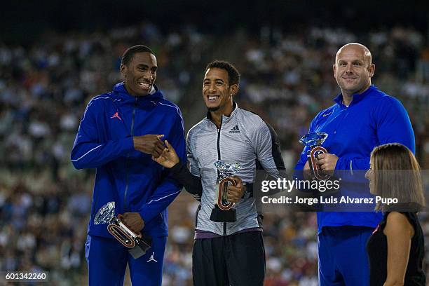 Erik Kynard Jr of USA, Orlando Ortega of Spain and Piotr Malachovski of Poland stand at the podium with their trophies during the AG Insurance...