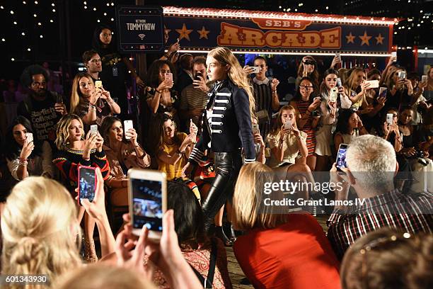 Model Gigi Hadid walks the runway at the #TOMMYNOW Women's Fashion Show during New York Fashion Week at Pier 16 on September 9, 2016 in New York City.