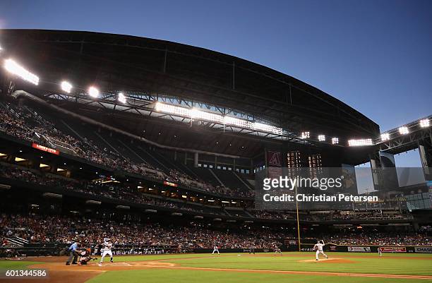 Starting pitcher Madison Bumgarner of the San Francisco Giants pitches against the Arizona Diamondbacks during the first inning of the MLB game at...
