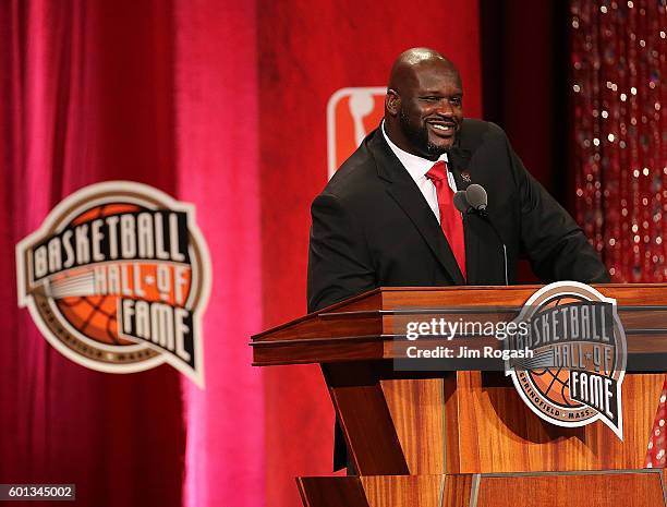 Shaquille O'Neal reacts during the 2016 Basketball Hall of Fame Enshrinement Ceremony at Symphony Hall on September 9, 2016 in Springfield,...