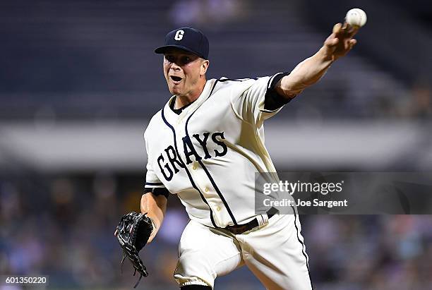 Tony Watson of the Pittsburgh Pirates pitches during the ninth inning against the Cincinnati Reds on September 9, 2016 at PNC Park in Pittsburgh,...