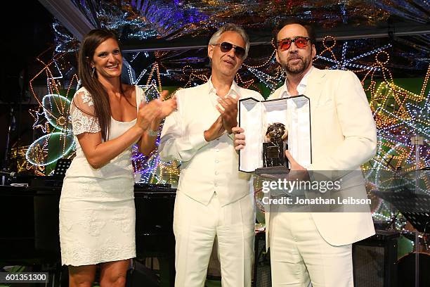 Veronica Bocelli, Andrea Bocelli and Nicolas Cage attend a dinner and reception at Andrea Bocelli's country home as part of Celebrity Fight Night...