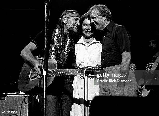 December 12: Former President Jimmy Carter with Former First Lady Rosalynn join Willie Nelson and perform at The Omni Coliseum in Atlanta Georgia....