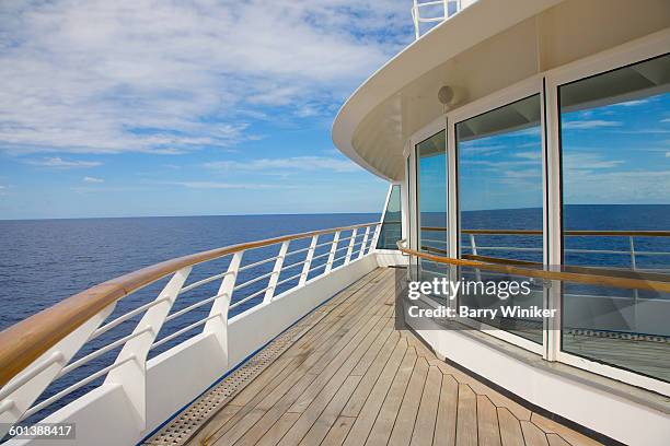 reflections of sea on windows of yacht - spartan cruiser stock pictures, royalty-free photos & images