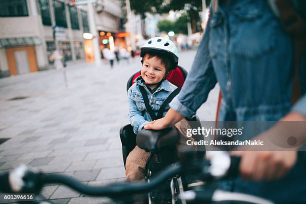 cycling the city with my mom - family biking stock pictures, royalty-free photos & images
