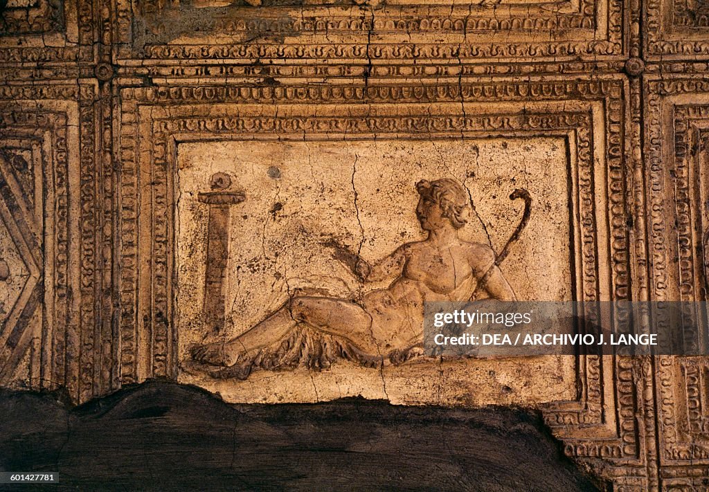 Panel with relief on the Decumanus Maximus...