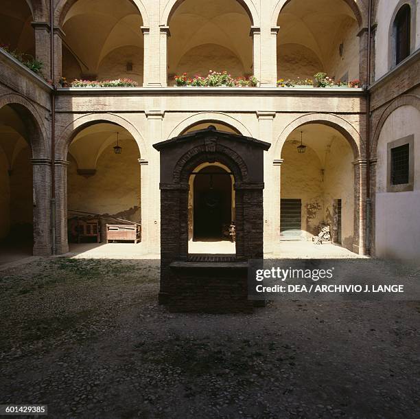 Courtyard of the Grand Ducal Commissioners or Praetorian palace surrounded by a three-tiered portico, with a well in the centre, Terra del Sole,...