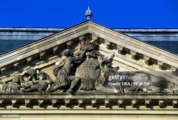 Coat of arms on the pediment of the facade of Chateau de Sable, 1715-1750, technical centre of the National Library of France, Pays de la Loire....