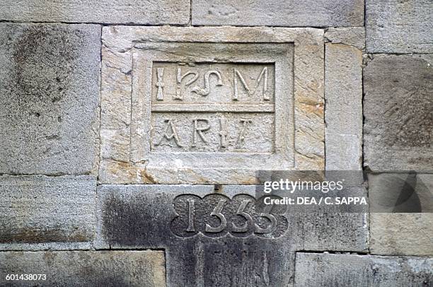 Inscription bearing the date 1555, the year in which the castle was modified, Chateau d'Etchauz, Saint-Etienne-de-Baigorry, France, Aquitaine,...