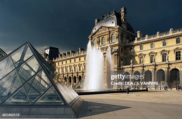 Richelieu pavilion and the Cour Napoleon, Louvre museum, Paris , Ile-de-France, France.
