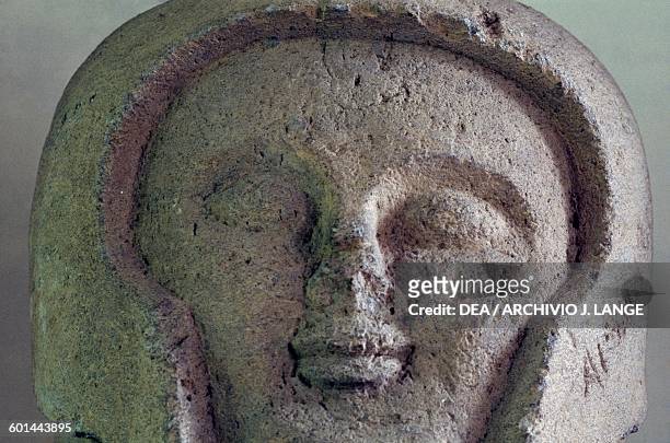 Cippus in the shape of a warrior head, from the Necropolis of the Crocifisso del Tufo, Orvieto, Italy. Etruscan civilisation. Orvieto, Museo Claudio...