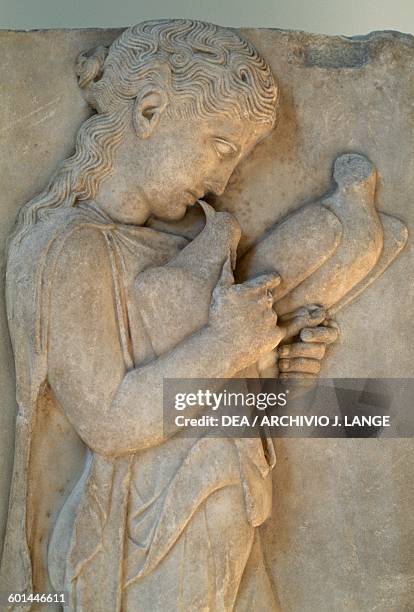 Grave marker of a young girl, ca 430 bC, marble relief, from Paros, Greece. Greek civilisation, 1st century bC. New York, The Metropolitan Museum Of...