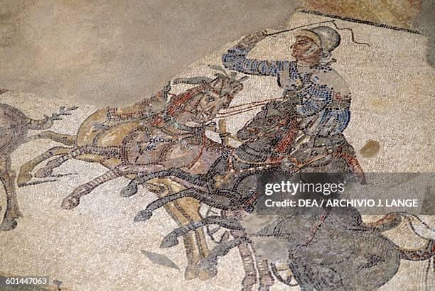 Mosaic floor depicting the Quadriga race in the Circus maximus from the palaestra, Villa Romana del Casale , Piazza Armerina, Sicily. Roman...