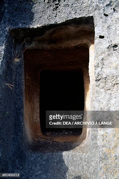 Rock-cut tomb, Necropolis of Pantalica , Sortino, Sicily, Italy. Pantalica culture, 15th-7th century BC.