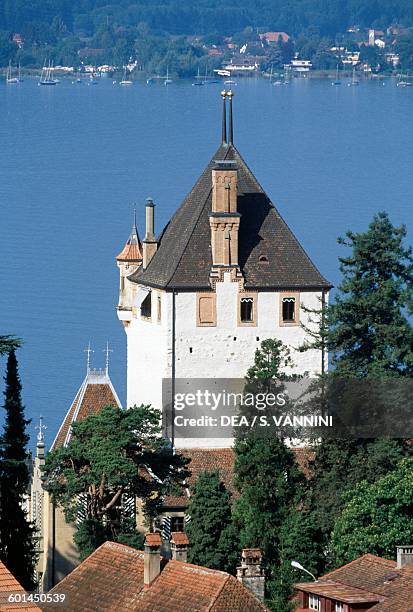 View of Oberhofen Castle and Lake Thun, Canton of Bern, Switzerland.