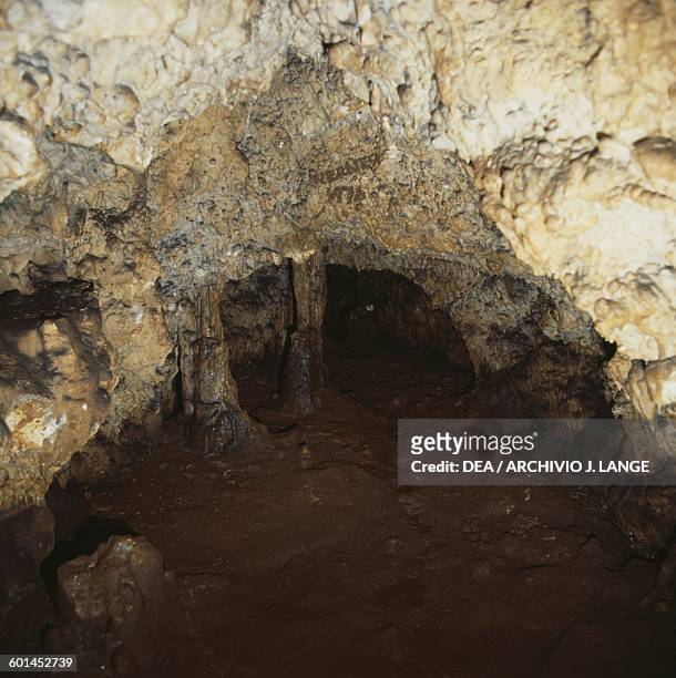 Cave near the Rocky Necropolis of Pantalica, Pantalica Nature Reserve, Cava Grande torrent valley and the Anapo river valley, Sicily, Italy.