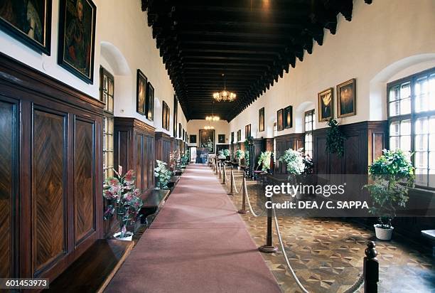 The winter garden with wood panelling and paintings, Bojnice castle. Slovakia, 12th-19th century.