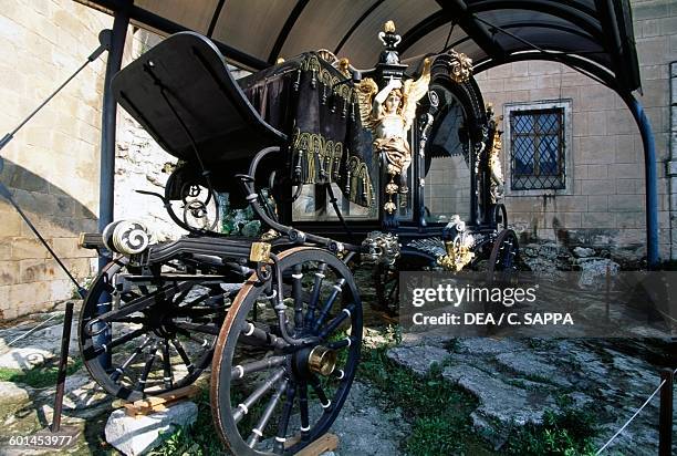 Nineteenth century hearse in the courtyard of Bojnice castle. Slovakia, 12th-19th century.
