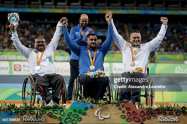 Silver medalist Luis Alberto Zepeda Felix of Mexico, gold medalist Manolis Stefanoudakis of Greece and bronze medalist Aliaksandr Tryputs of...