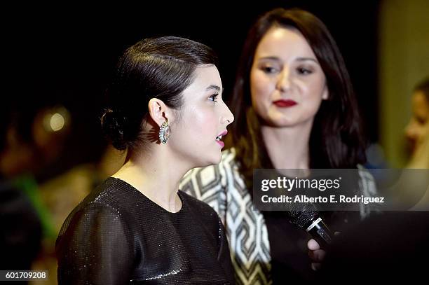 Actresses Chelsea Islan and Julie Estelle attend the "Headshot" premiere during the 2016 Toronto International Film Festival at Ryerson Theatre on...