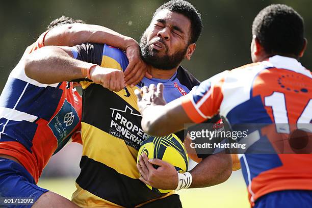 Onehunga Havili of the Spirit is tackled during the round three NRC match between the Western Sydney Rams and the Perth Spirit at Concord Oval on...