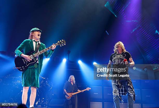Angus Young, Cliff Williams and Angus Young of AC/DC perform during the Rock Or Bust Tour at The Palace of Auburn Hills on September 9, 2016 in...