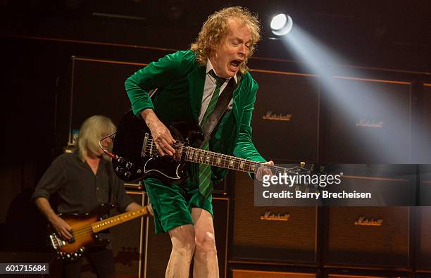 Cliff Williams and Angus Young of AC/DC performs during the Rock Or Bust Tour at The Palace of Auburn Hills on September 9, 2016 in Auburn Hills,...