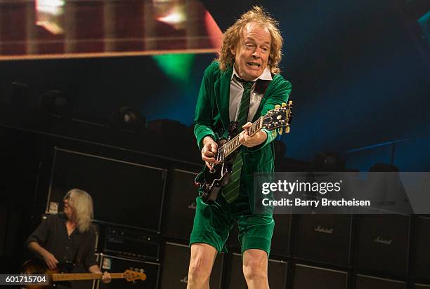 Cliff Williams and Angus Young of AC/DC perform during the Rock Or Bust Tour at The Palace of Auburn Hills on September 9, 2016 in Auburn Hills,...