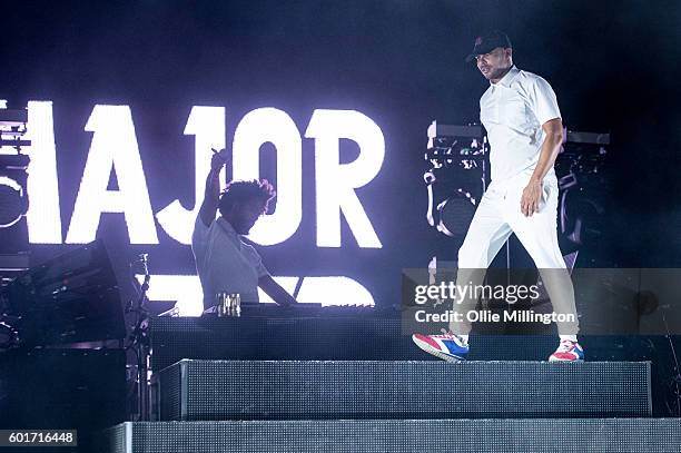 Jillionaire and Walshy Fire of Major Lazer perform onstage headlining The Main stage at the end of Day 2 of Bestival 2016 at Robin Hill Country Park...