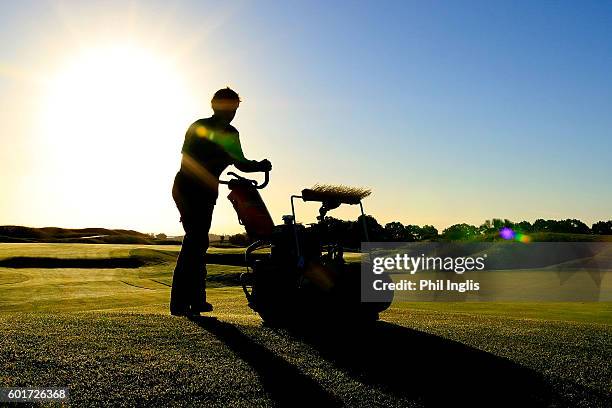 Greenstaff final preparation of the 14th green during the second round of the Paris Legends Championship played on L'Albatros Course at Le Golf...