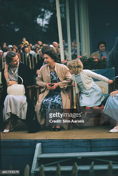 Princess Alice, Duchess of Gloucester , Queen Elizabeth II and Princess Anne at the Ascot Week polo tournament in Windsor Great Park, June 1955....