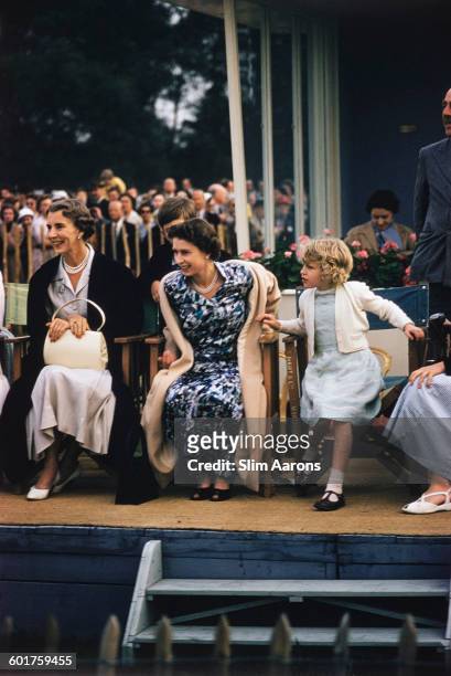 Princess Alice, Duchess of Gloucester , Queen Elizabeth II and Princess Anne at the Ascot Week polo tournament in Windsor Great Park, June 1955....