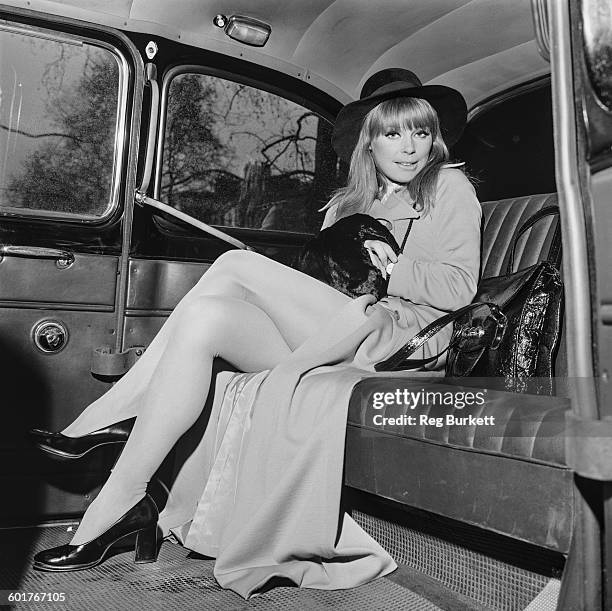 German actress Elke Sommer on her way to rehearse for a part in a television show, UK, 14th March 1970.