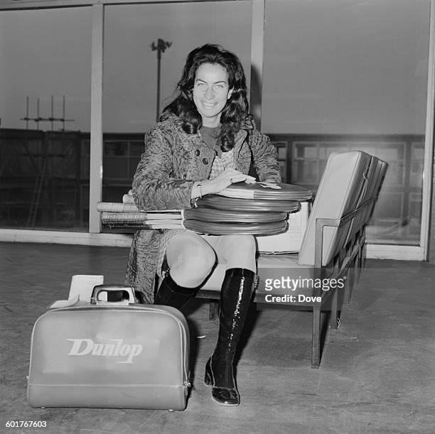 British tennis player Virginia Wade at London Airport, UK, 31st January 1970. She is leaving for Philadelphia to compete in a tennis tournament.