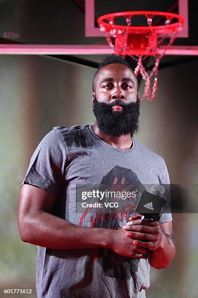 American basketball player James Harden interacts with fans at New World Taiping Lake Garden on September 9, 2016 in Shanghai, China.