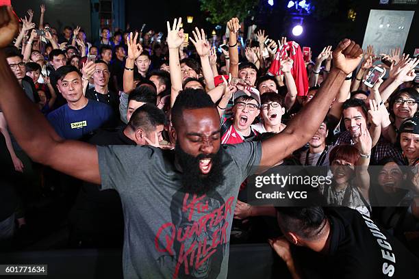 American basketball player James Harden interacts with fans at New World Taiping Lake Garden on September 9, 2016 in Shanghai, China.