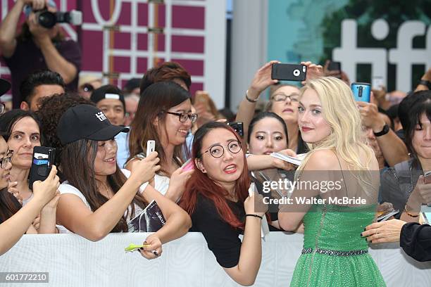 Dakota Fanning, with her fans, attends the 'American Pastoral' during the 2016 Toronto International Film Festival premiere at Princess of Wales...