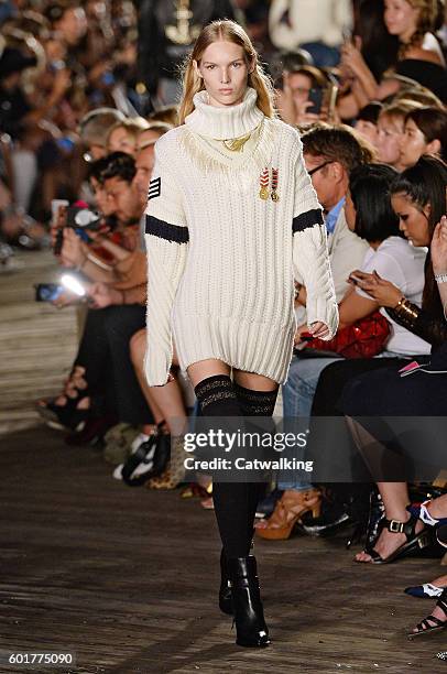 Model walks the runway at the TommyNow by Tommy Hilfiger Fall Winter 2016 fashion show during New York Fashion Week on September 9, 2016 in New York,...