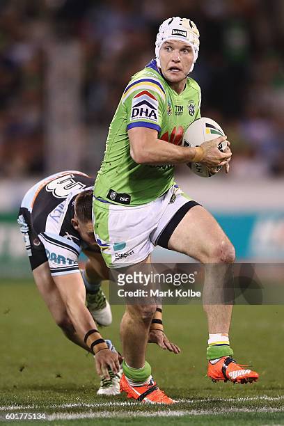 Jarrod Croker of the Raiders makes a break during the NRL Qualifying Final match between the Canberra Raiders and the Cronulla Sharks at GIO Stadium...
