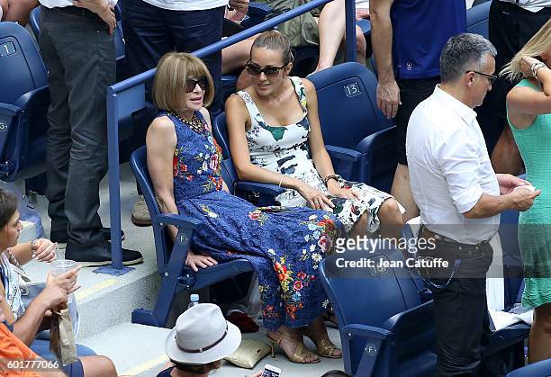 Anna Wintour and Jelena Djokovic, Novak's wife, attend the men's semifinal between Novak Djokovic of Serbia and Gael Monfils of France at Arthur Ashe...