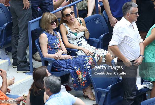 Anna Wintour and Jelena Djokovic, Novak's wife, attend the men's semifinal between Novak Djokovic of Serbia and Gael Monfils of France at Arthur Ashe...