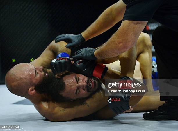 Robert Turnquest fight Taylor Krahl in their 175 Catchweight bout during the TITAN FC41 UFC fight event at Bank United Center on September 9, 2016 in...