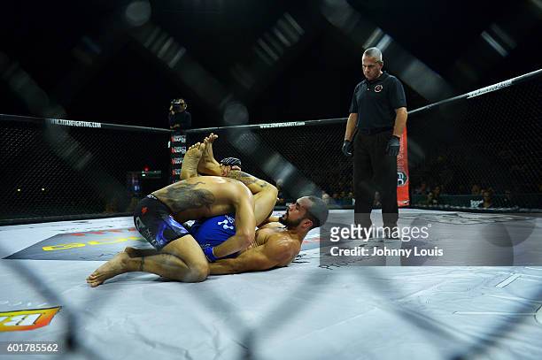 Taylor Krahl fight Robert Turnquest in their 175 Catchweight bout during the TITAN FC41 UFC fight event at Bank United Center on September 9, 2016 in...