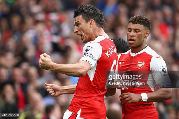 Laurent Koscielny of Arsenal scores his sides first goal during the Premier League match between Arsenal and Southampton at Emirates Stadium on...