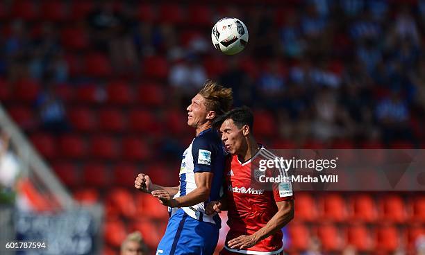 Niklas Stark of Berlin and Alfredo Morales of Ingolstadt jump for a header during the Bundesliga match between FC Ingolstadt 04 and Hertha BSC at...