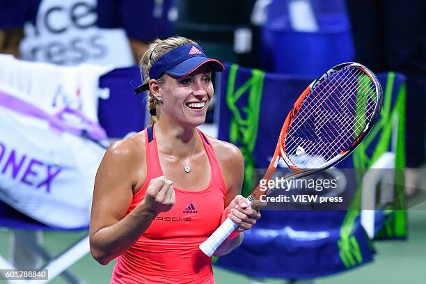 Angelique Kerber of Germany celebrates her victory over Caroline Wozniacki of Denmark during their Women's Singles Semifinal Match of the 2016 US...