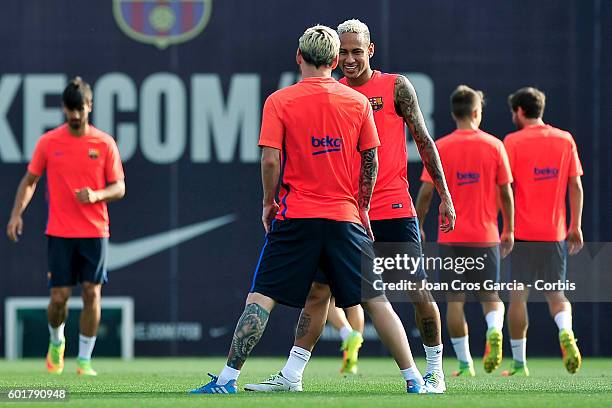 Lionel Messi and Neymar Jr., attend a training session at the Sports Center FC Barcelona Joan Gamper, before the Spanish League match between...