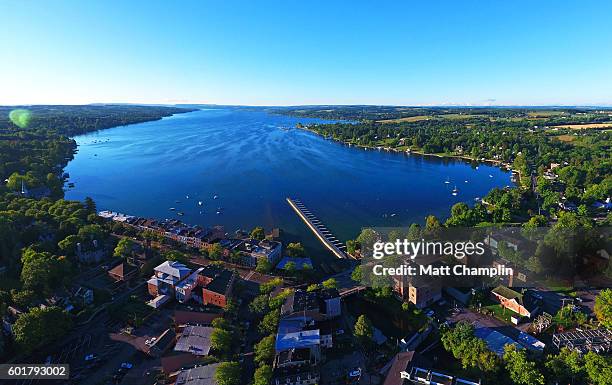 aerial of skaneateles lake and village - フィンガーレイク ストックフォトと画像