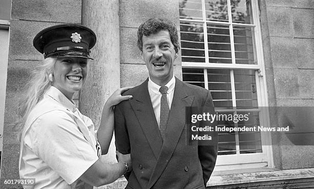 The New York Rose, Kelly Moran a member of the New York Police Departmant tries on a Garda Cap when the Roses visited Leinster House also in the...